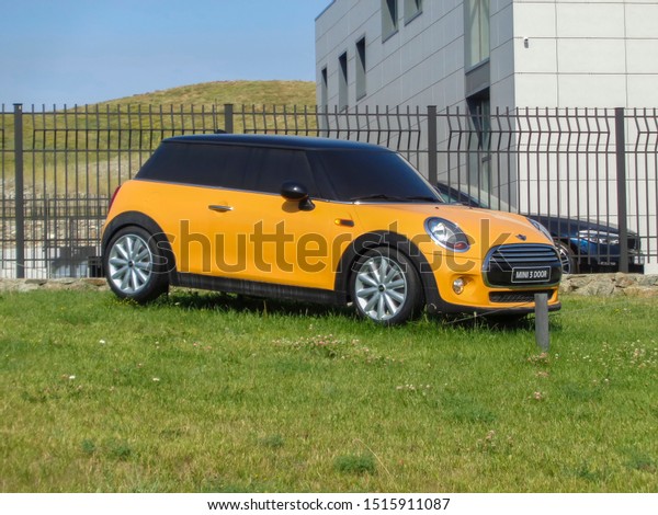Kazakhstan, Ust-Kamenogorsk, july 18, 2019: Mini Cooper\
3 Door (Advertising model). Bright yellow car                      \
   