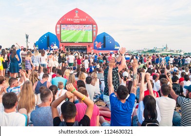 KAZAN, RUSSIA - 1 JULY, 2018: Russia football fans cheering at Kazan Fan Fest Zone after Russia's victory in Spain vs Russia match.