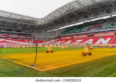 Kazan, Russia. 2022 March 28. Assimilation lighting in soccer stadium. Lighting assimilation off grass. View of light therapie in stadium. The LED grass grow lights