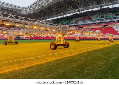 Kazan, Russia. 2022 March 28. Assimilation lighting in soccer stadium. Lighting assimilation off grass. Close up view of light therapie in stadium. The LED grass grow lights