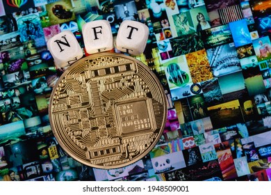 Kazan, Russia - April 03, 2021: The word NFT (non-fungible token) is laid out of cubes with letters and golden cryptocoin on background Beeple digital art EVERYDAYS: THE FIRST 5000 DAYS.
