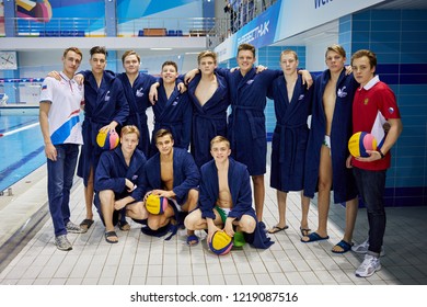 KAZAN, RUSSIA - DEC 09, 2017: Youth Team For Water Polo At Poolside In Burevestnik Basin During All Russia Swimming Competition, Alexander Popov Cup. 