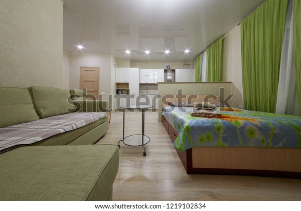 KAZAN, RUSSIA - DEC 7,\
2017: Modern flat divided into kitchen and living zones in hotel\
Apartments on Bauman. Apartments located near Kazan Kremlin and Kul\
Sharif Mosque.