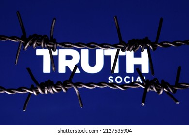 Kazan, Russia - Feb 22, 2022: Truth Social Network Logo Behind Barbed Wire. The Concept Of Truth Social Censorship And Prohibition.