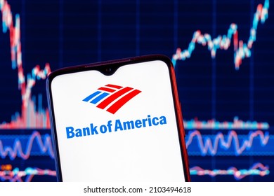 Kazan, Russia - Jan 09, 2022: Smartphone with Bank of America logo. Bank of America stock chart on the background.
