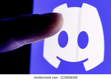 Kazan, Russia - Jan 20, 2022: The Finger Reaches For The Discord Social Gaming Platform Logo On The Smartphone Screen.