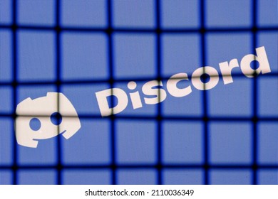 Kazan, Russia - Jan 20, 2022: The Logo Of The Discord Social Gaming Platform Behind Bars. The Concept Of Discord Censorship And Prohibition.