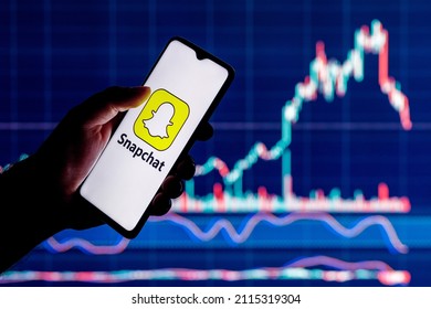 Kazan, Russia - Jan 30, 2022: Smartphone With Snapchat Instant Messaging Service Logo On Screen. Snapchat Stock Chart On The Background.