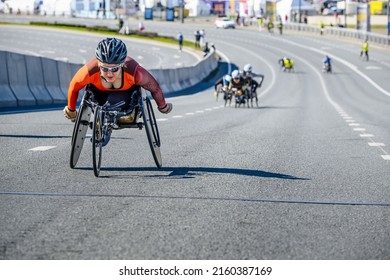 Kazan, Russia - May 17, 2022: Female Disabled Athlete In Wheelchair During Kazan Marathon