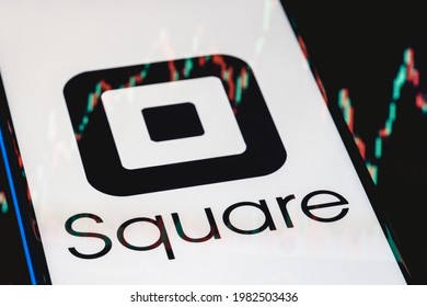 Kazan, Russia - May 30, 2021: Square is technology company that develops solutions for accepting and processing electronic payments. Square logo on smartphone screen. Stock chart in the reflection.