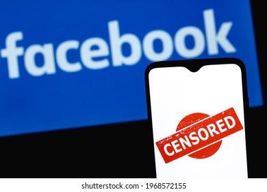 Kazan, Russia - May 4, 2021: The photo illustrates the use of censorship in the social network facebook. Censored in Facebook. Word "CENSORED" on the background of the Facebook logo.