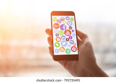 KAZAN, RUSSIA - NOVEMBER 22, 2017: Woman pointing on social media icons on a smartphone - Shutterstock ID 793735495