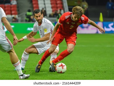 Kazan, Russia – October 10, 2017. Iran National Football Team Left-back Ehsan Hajsafi Against Russia Defender Mario Fernandes During International Friendly Russia Vs Iran (1-1)