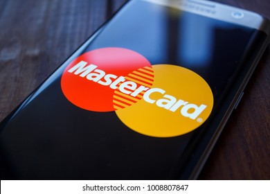 Kazan, Russian Federation - Jan 13, 2018: Modern lifestyle with smartphone to stay connected and browsing using favourite Apps. Payment is easy when you can access with MasterCard Via smartphone