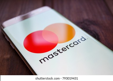 Kazan, Russian Federation - Jan 13, 2018: Modern lifestyle with smartphone to stay connected and browsing using favourite Apps. Payment is easy when you can access with MasterCard Via smartphone