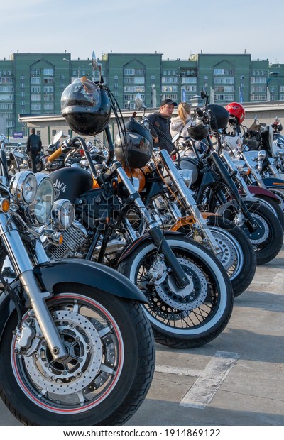 Kazan,\
Russia-September 26, 2020: Beautiful, clean and shiny classic\
motorcycles standing in a row in the parking\
lot