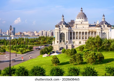 Kazan in summer, Tatarstan, Russia. Scenic view of Farmers Palace (Ministry of Environment and Agriculture) and beautiful green park in Kazan city center. This place is landmark of Kazan.