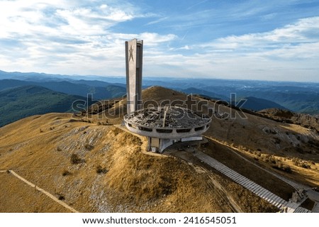 Kazanlak Monument House Bulgarian Communist Party. Buzludzha Memorial House in Bulgaria. Monument symbol to Communism on top of mountain sunset summer drone flyby areal view