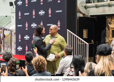 Keanu Reeves. Actor's Handprints and Footprints Cemented on Hollywood Boulevard. Chinese Theater Event, Guests, Celebrities, Halle Berry, Laurence Fishburne.
Hollywood, California, USA, May 14, 2019