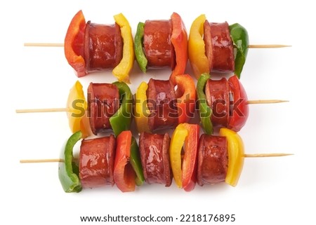Kebab - grilled pork sausage skewers and vegetables BBQ, close-up, isolated on white background. Foto stock © 
