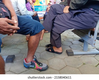 Kebumen, Central Java, Indonesia - May 17, 2022 : Sitting People Waiting In Line To Pay Motor Vehicle Tax At The Motor Vehicle Tax Payment Office In Gombong, Kebumen