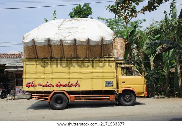 Kebumen,
Indonesia - August, 2015: An overloaded truck is parked on the side
of the road in Sempor, Kebumen,
Indonesia.