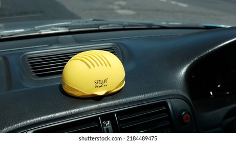 Kebumen, Indonesia - March, 2017: Yellow Car Fragrance On The Dashboard.