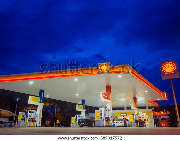 Kedah, Malaysia\
- February 27, 2017: Shell gas station blue sky background during\
sunset. Royal Dutch Shell sold its Australian Shell retail\
operations to Dutch company Vitol in\
2014