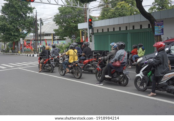 Kediri, East Java, Indonesia -
February 16th, 2021: Vehicle on the road with a natural
background