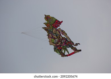 Kediri, East Java, Indonesia - November 21st, 2021 : The Participant Of The Indonesian Kites Festival And Their Kite With Wayang Shape