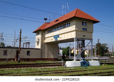 KEDZIERZYN-KOZLE, POLAND - AUGUST 3, 2022: Signalling Control Centre Or Dispatch Office (Nastawnia KKA Kędzierzyn-Koźle). Signal Box, Interlocking Tower Or Signal Cabin Above Train Tracks.