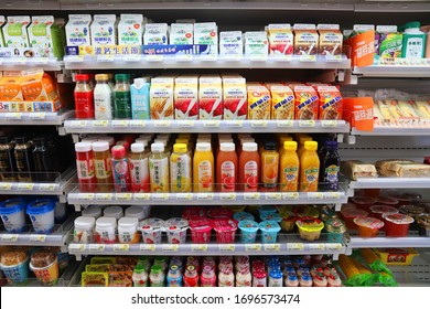 KEELUNG, TAIWAN - NOVEMBER 24, 2018: Milk Drinks, Yoghurts And Juices Selection At A Convenience Store Refrigerator In Keelung, Taiwan.