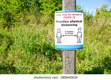 Keep 2 Metres Physical Distancing Sign At Park.