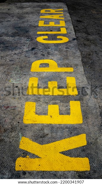 KEEP CLEAR road markings\
grunge 