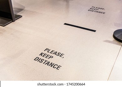 Keep Distance Sign In Front Of Purchase Counter In Department Store For People To Wait In Line. New Normal For Prevent And Stay Safe From Corona Virus Or Covid-19.