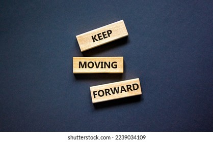 Keep moving forward symbol. Concept words Keep moving forward on blocks on beautiful black table black background. Business, motivation and keep moving forward concept. Copy space. - Shutterstock ID 2239034109