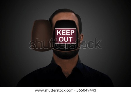 Keep out" sing inside an opened man's head.