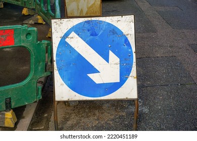 Keep right sign at road works site. Directional warning sign for vehicles due to road maintenance. 