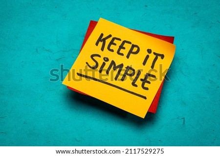 keep it simple  inspirational writing - reminder note on a brown textured mulberry paper, simplicity, minimalism and lifestyle concept