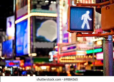 Keep Walking New York Traffic Sign With Illuminated And Blurred Background