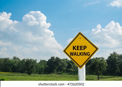 Keep Walking Traffic Sign On The Road