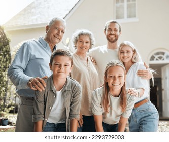 Keep your family close. Shot of a multi-generational family standing together outside.