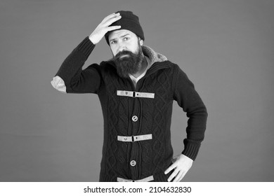 Keep Your Head Warm. Knitted Accessory. Bearded Man Knitwear Sweater. Get Warm And Comfortable. Hipster Mens Jacket. Sad Man Autumn Style. Beard Care In Winter. Male Fashion. Brutal Man Knitted Hat