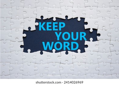 Keep your word symbol. Concept words Keep your word on white puzzle. Beautiful deep blue background. Business and Keep your word concept. Copy space.