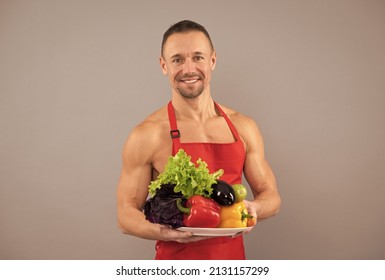 Keeping Body Light And Nourished. Muscular Man Hold Veggie Tray. Vegetarian Diet. Vegetarian Food