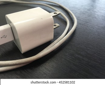Keeping charger put on table