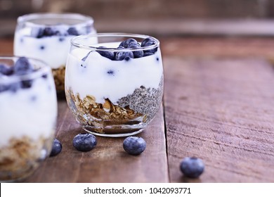 Kefir yogurt and chia parfaits. Kefir is one of the top health foods available providing powerful probiotics. Extreme shallow depth of field. - Powered by Shutterstock