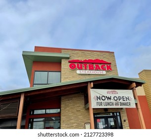 Keizer, Oregon, USA - February 3, 2022: Sign over entrance to Outback Steakhouse restaurant.