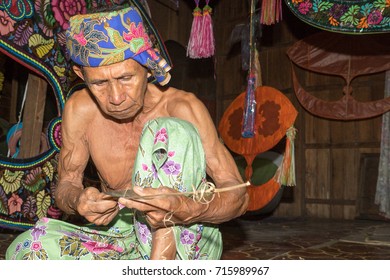 KELANTAN, MALAYSIA - 15 July 2017: Unidentified Man Is Making The Traditional Moon Kite Or Locally Known As 