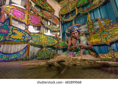 KELANTAN, MALAYSIA - 15TH JULY 2017; Unidentified Man Is Making The Traditional Moon Kite Or Locally Known As 